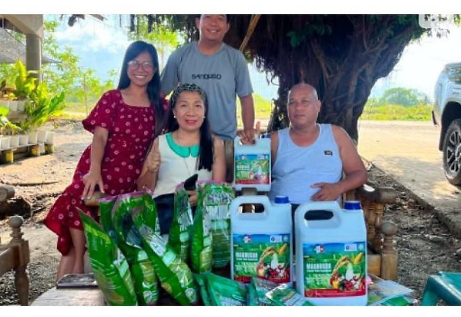 Farmers and community members with agricultural products